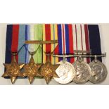 Group court mounted as worn - 1939-45 Star, Atlantic Star + France & Germany clasp, Africa Star +