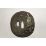 Japanese Tsuba probably in bronze, shows various images on both sides, GVF