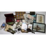 A good box of general militaria including: WW1 & 2 photographs, trench art, bayonet frogs, part of a
