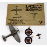 RAF items: 1) Two WW2 period models of Spitfire. 2) Two 'Wings for Victory' badges. 3) WW2