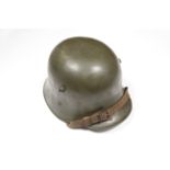 Austrian WW1 Stormtroopers tin helmet / Stalhelm complete with liner and chin strap, in good order.