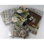 Plastic crate containing large quantity of cards mainly in pages, many overseas issues noted,