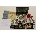 Small box of various Militaria inc Cap badges, cloth badges, etc etc, plus an unusual WW1 (1917