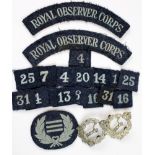 Royal Observer Corps. 2 Cap Badges, Arm Badges and Group Number Badges (approx 30)