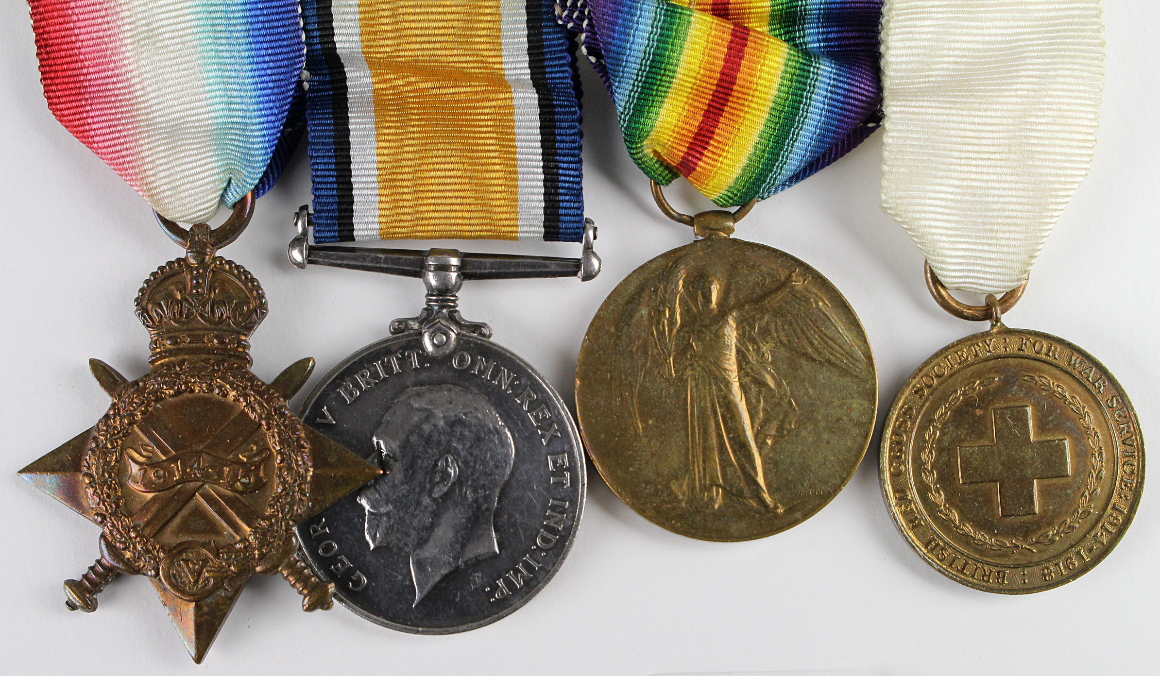 1915 Star Trio + British Red Cross Society for War Service 1914-1918 Medal, mounted as worn to 11167