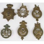 Glengarry badges inc No 2, No 44, No 54 West Norfolk Regt, No 56, No 82 Prince of Wales