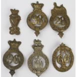 Glengarry badges inc No 98 Regiment, No 99 Duke of Edinburgh's Regt, No 88, The Queens Own Light