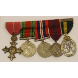 Group mounted as worn - MBE (Mily), Defence & War Medal, 1953 Coronation Medal, and Efficiency