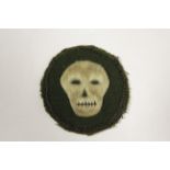 Badge a cloth 3 Commando skull emboided on green background.