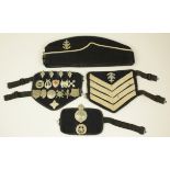 Boys Brigade collection of badges, sleeve bands and cap, all owned by the vendors father who