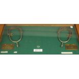 Large wall display case with glazed door, housing a pair of Spurs and two brass plaques both Suffolk