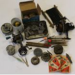 Fishing interest. Box of fishing related items, including reels, weights, floats etc. (sold as