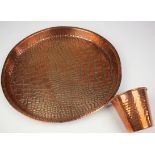 Copper tray by Joseph Sankey with crocodile skin effect, diameter 31cm approx., together with a
