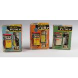 Britains. Three boxed Britains Shell & Esso Petrol Pumps, nos. 1260, 1261 & 1263 (sold as seen)