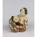 Erotic netsuke, depicting a Japanese man & woman, height 4.8cm approx.