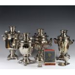 Six Russian silver plated tea urms of various sizes