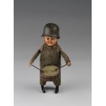 Schuco clockwork tinplate toy in the form of a soldier drummer boy, key missing, untested, height