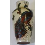 Hand painted vase by Watcombe, Torquay, with peacock decoration, height 32.5cm approx.