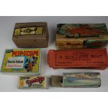 Six boxed toys, comprising Minister Delux, Penguin Plastic Racer, Penguin High Speed Cruiser,