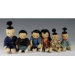 Six oriental cloth dolls, circa early to mid 20th century, each wearing clothes, height 32cm &