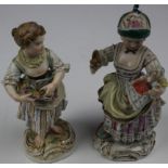 Two Meissen figurines, comprising a girl holding flowers and another holding a doll, height 14cm and