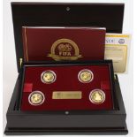 Fifa 100 Years commemorative gold proof coin set 2004. This set presented in a plush wooden case