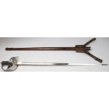 British Officers GVI dress sword with leather scabbard and frog. Blade maker marked 'Henry Wilkinson