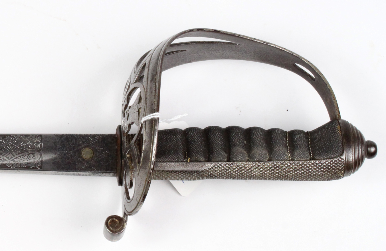 Sword: A good 1827 Pattern Rifle Officers Sword. Blade 32.5" finely etched blade with strung bugle