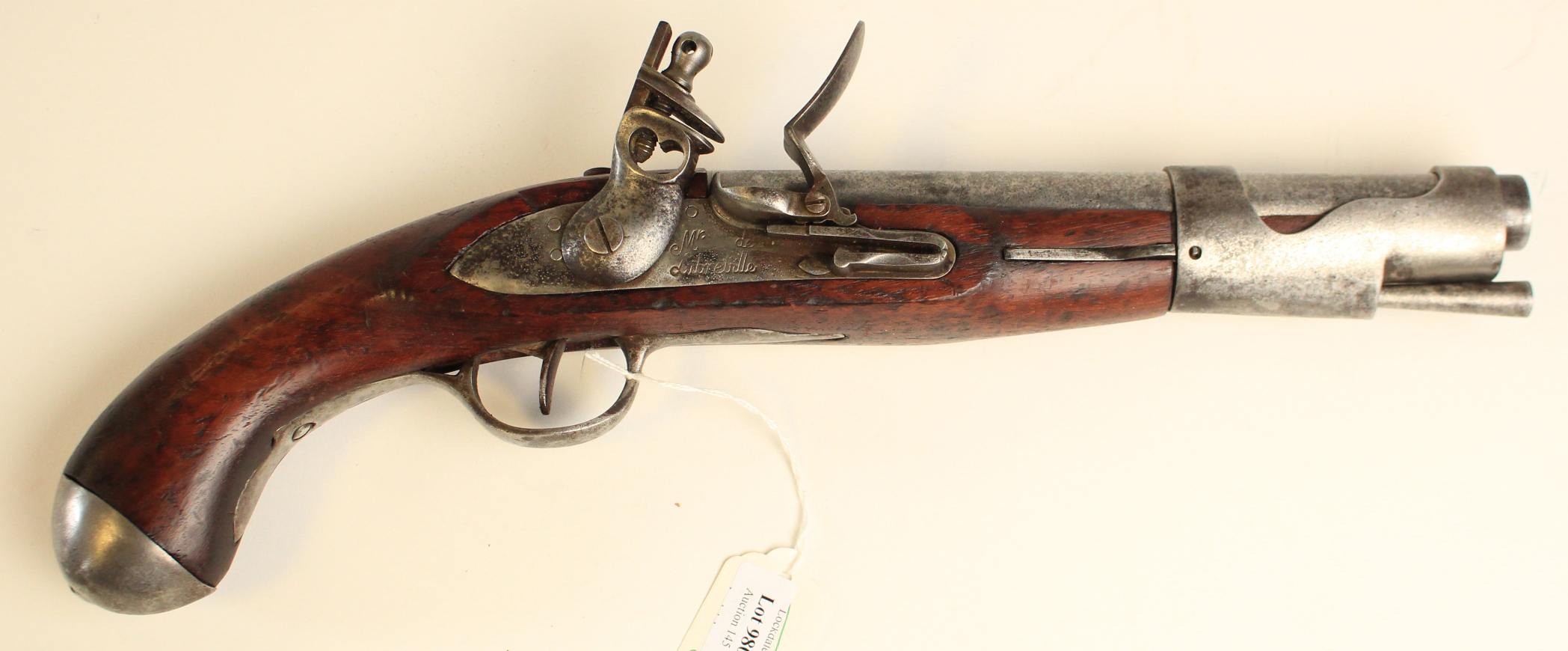 Pistol: A good model of a French model 1763 Flintlock pistol. Barrel 9" Tang marked 'M1763' Lock