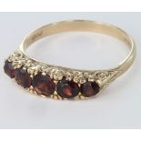 9ct Gold 5 stone Garnet Ring size Q weight 2.6 grams