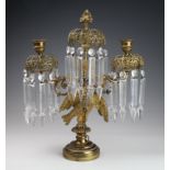 Possible French 19thC gilt metal double candlestick featuring eagle, with hanging glass lustres (