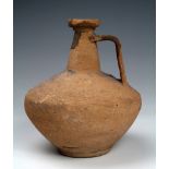 Ancient, complete, Roman? pot, in reddish clay, once covered in a hard fired surface of a dark
