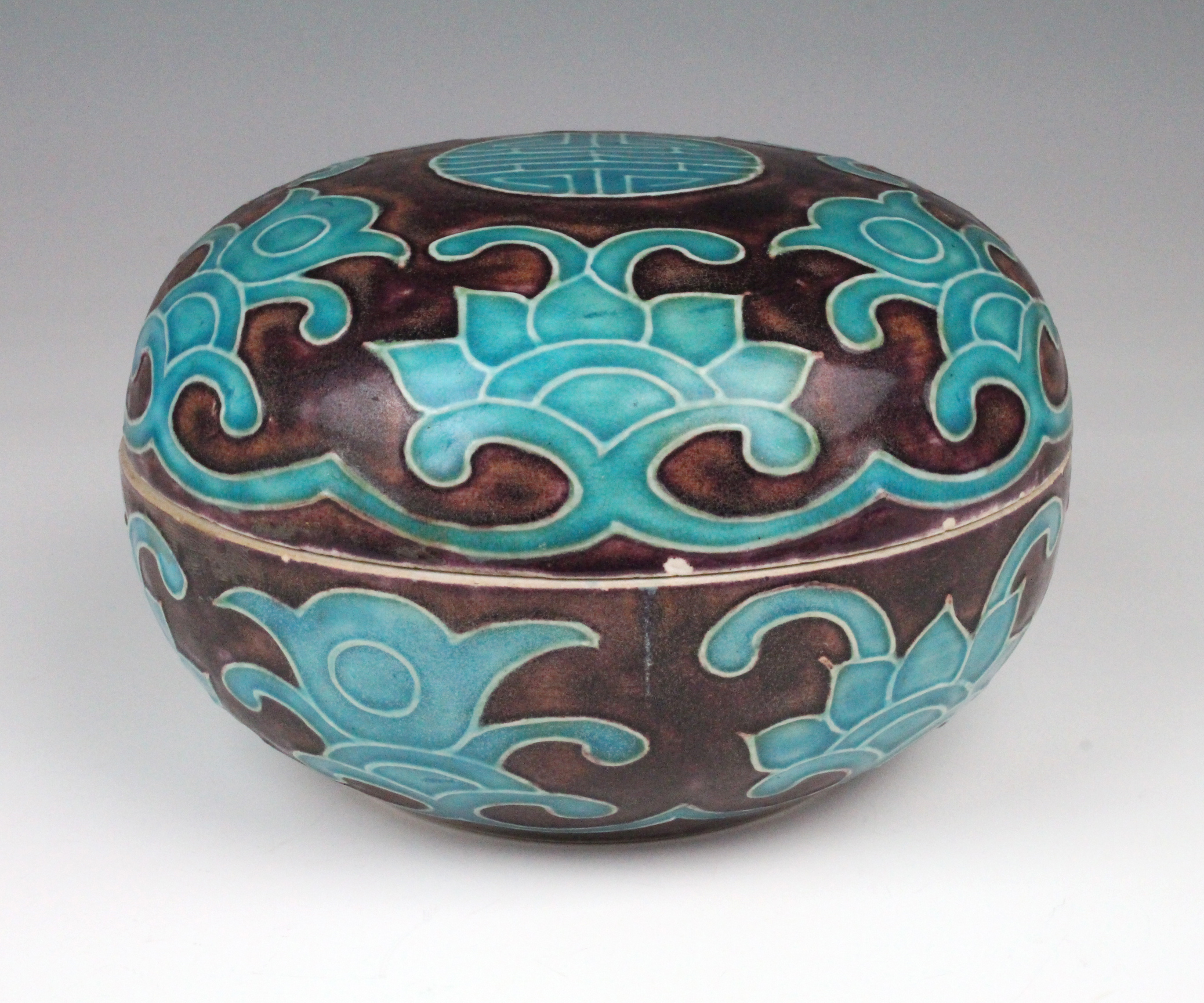 Chinese glazed ceramic pot with lid, circa early 19th century, Chinese stamps to base, diameter 18cm