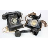 Black bakelite telephone, stamped to base 'FWR 57/2', together with a similar telephone (missing
