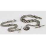 Two Silver "T" bar Pocket watch chains, one with a medal attached. Total weight approx 98.2g