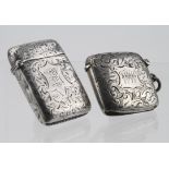 Two silver engraved Vestas hallmarked for Birmingham 1890 & 1902. Weight of both items - 41.2gms