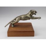 Desmo leaping Jaguar car mascot circa 1930s, from a SS100, mounted on a wooden plinth, height 8.5cm,