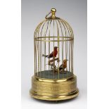 German automation bird cage, containing two singing birds, circa 20th century, height 28.5cm