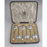 Six silver coffee spoons, with ornate enamel rose & bow decoration to reverse of each, hallmarked '