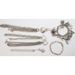 Collection of silver and silver plated items, including charm bracelets, chains etc., total weight