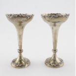 Pair of silver fluted flower vases, hallmarked 'London 1905', weighted bases, height 11.4cm approx