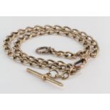 9ct Gold pocket watch chain and T Bar, length approx. 41cm and weighing 29.8g