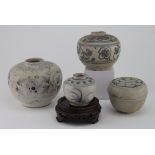 Ancient Chinese pots, blue and white, two with stickers, one Ex. wreck, one on polished wooden