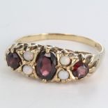 9ct Gold Ring set with Garnet and Opals size U weight 3.6 grams