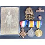 1915 Star Trio to 18464 Pte A King Suffolk Regt. With cap badge, titles and a postcard (qty)