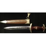 German WW2 SA Dagger with scabbard and metal hanger. Blade maker marked 'GEBR.HELLER', and