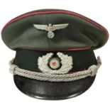 Officers Visor Cap with Celluloid makers diamond. Piped pink for Armoured Troops. Metal insignia