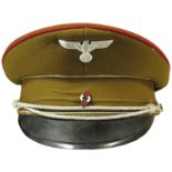 East German post war visor cap with mixed insignia attached.