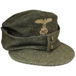 M43 Wool cap. SS insignia cloth. RB numbered internally on twill liner. Twin pebble button front