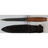 WW2 fighting knife by 'John Blyde Clintockworks Sheffield, Genius'. D/E blade 6.75", ribbed wooden